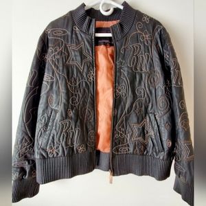 Y2k leather bomber jacket with unique stiching and soft copper colored lining